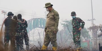 TIM SATGAS KARHUTLA KODAM XXII/TAMBUN BUNGAI TERUS LAKUKAN PENDINGINAN DI HIU PUTIH JEKAN RAYA